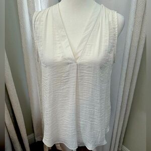 White sleeveless V neck Vince Camuto Blouse.